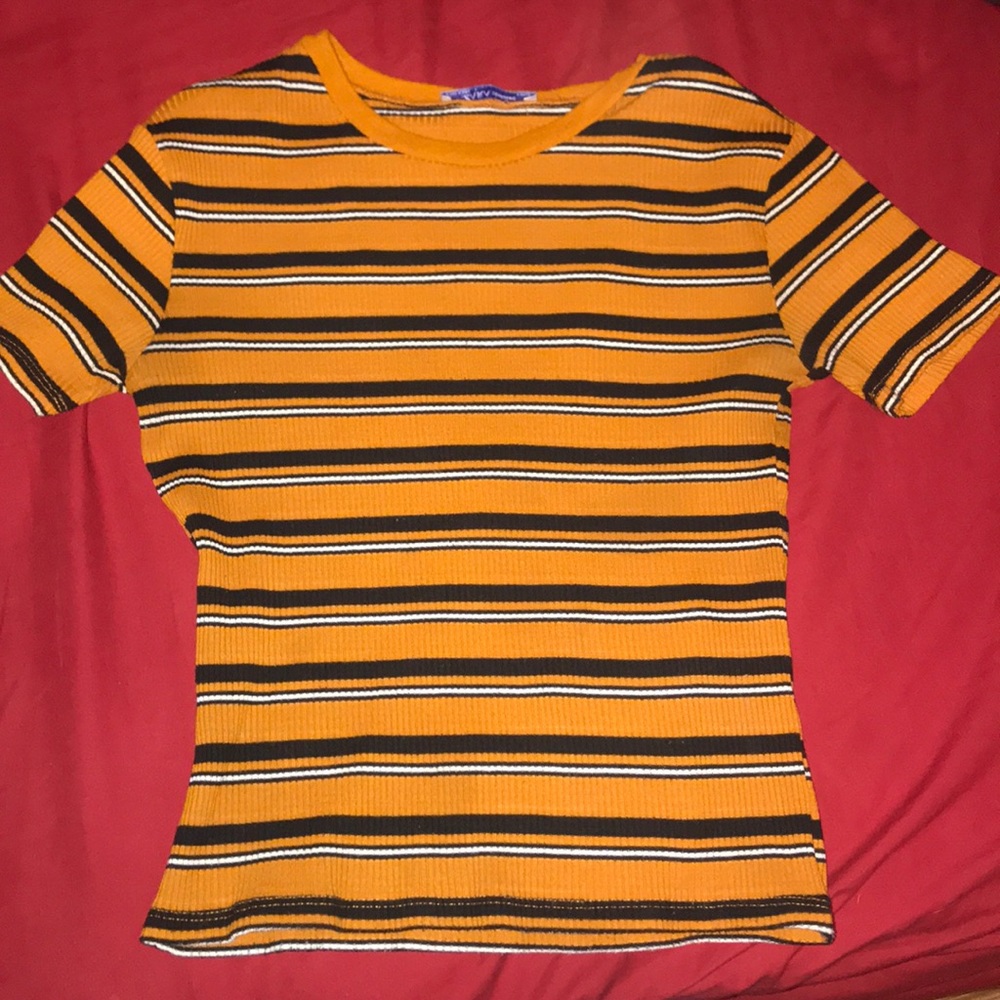 Orange tee shirt black and white stripes